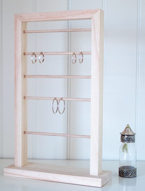 Expositor pendientes, tipo ventana con diferentes altura para pendientes grandes y pequeños tipo aro.
